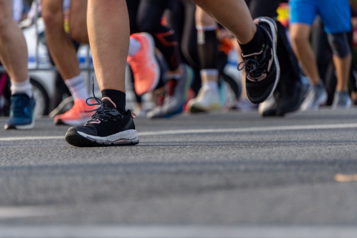 Runners' feet in motion during a race